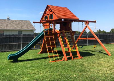 Farm-and-yard-65-Jaguar-Playground-wood-roof-treehouse-greenslide-customer-2