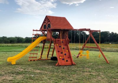 Farm-and-yard-65-Jaguar-Playground-wood-roof-treehouse-greenslide-customer-3