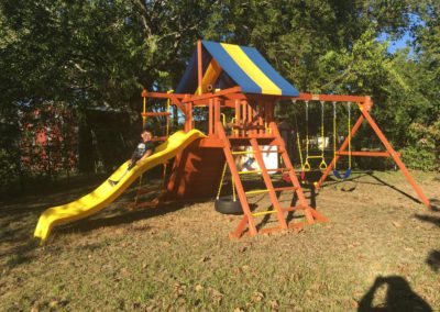Farm-and-yard-tx-Toucan Playcenter w: BYB Tarp and Yellow Wave Slide-Customer-6