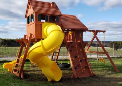 Farm-and-yard-central-texas-jaguar-playcenter-megasized-spiral-slide-customer-2