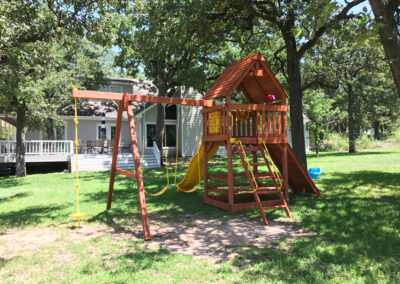 farm-and-yard-central-texas-parrot-island-fort-wood-roof-playground-customer-2
