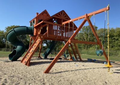 Farm-and-yard-megasized-rr-cabin-spiral-slide-customer-1