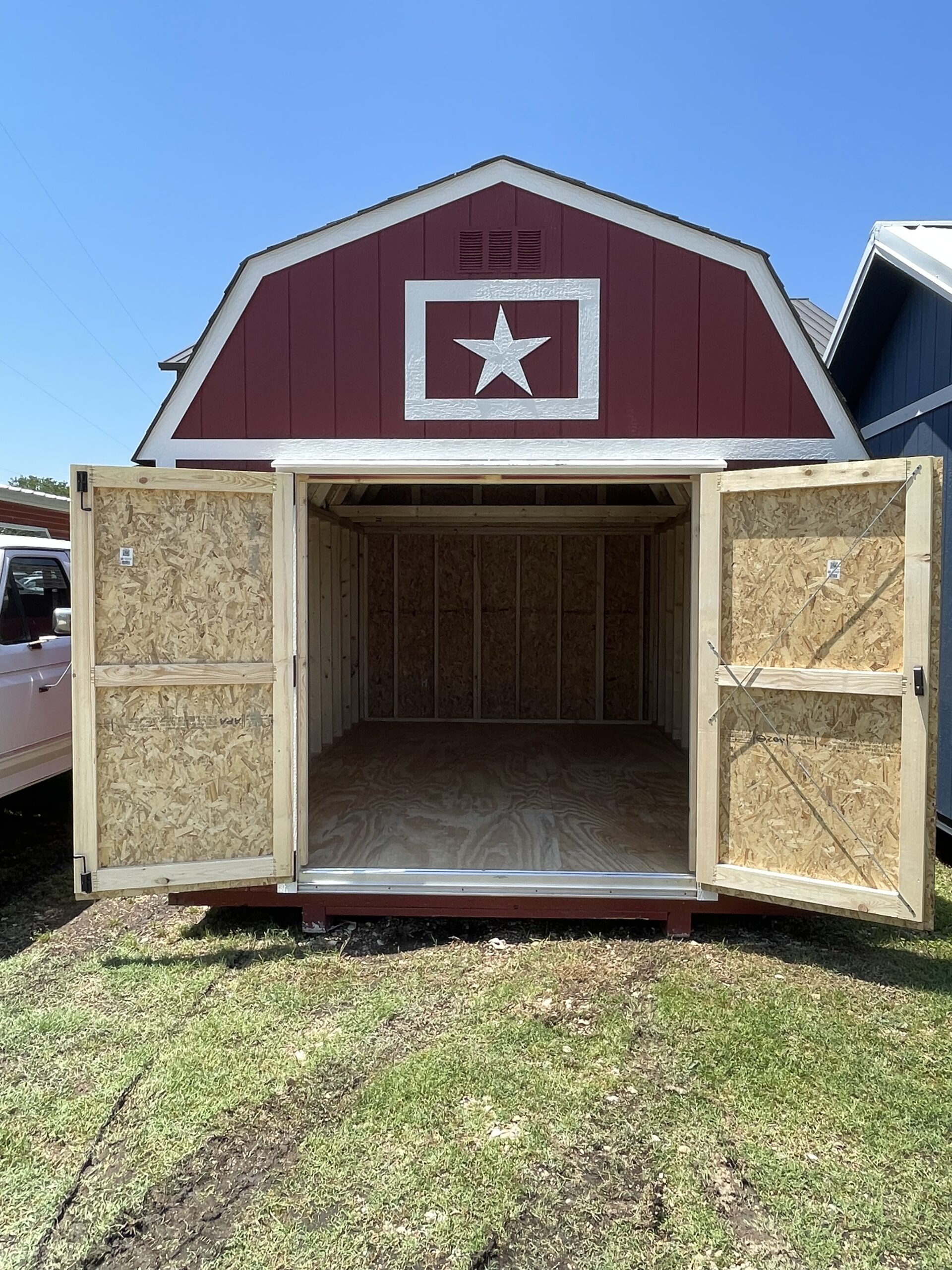 Exterior view of the 10x16 Lofted Barn with the double 6 x 6 shed doors open