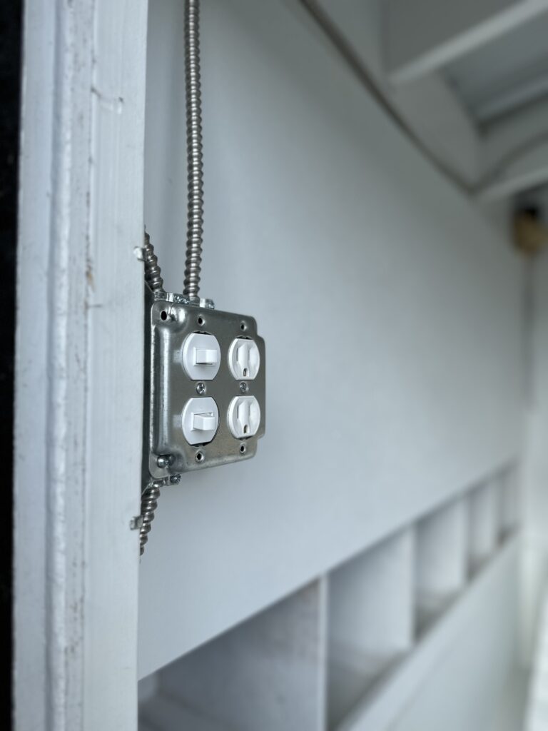 Interior and exterior light switches for the chicken coop along with 2 standard 100a outlets 
