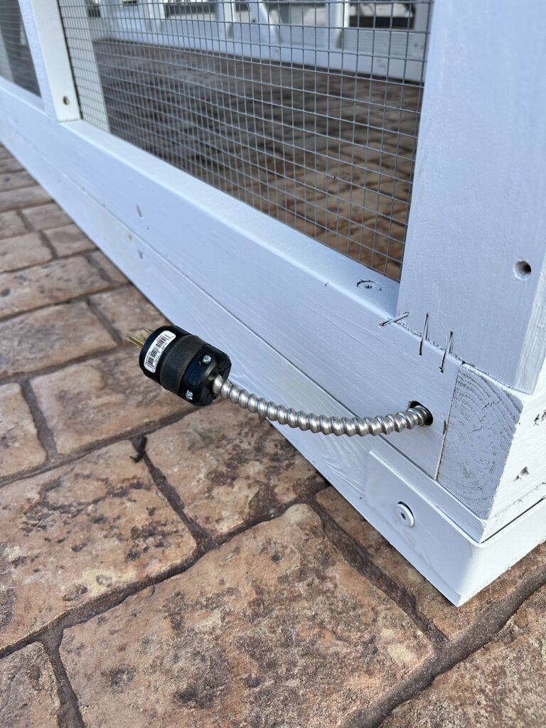 Standard 3 prong plug that powers the chicken coop 
