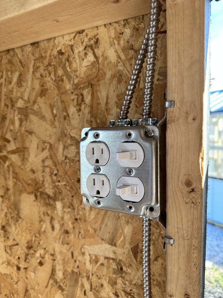 interior and exterior light switch with 110amp plugs 