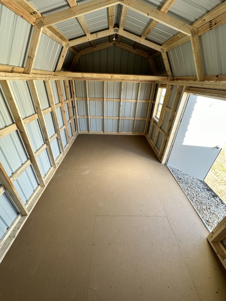 solid 2x4 wood framing throughout this 10x20 metal lofted barn