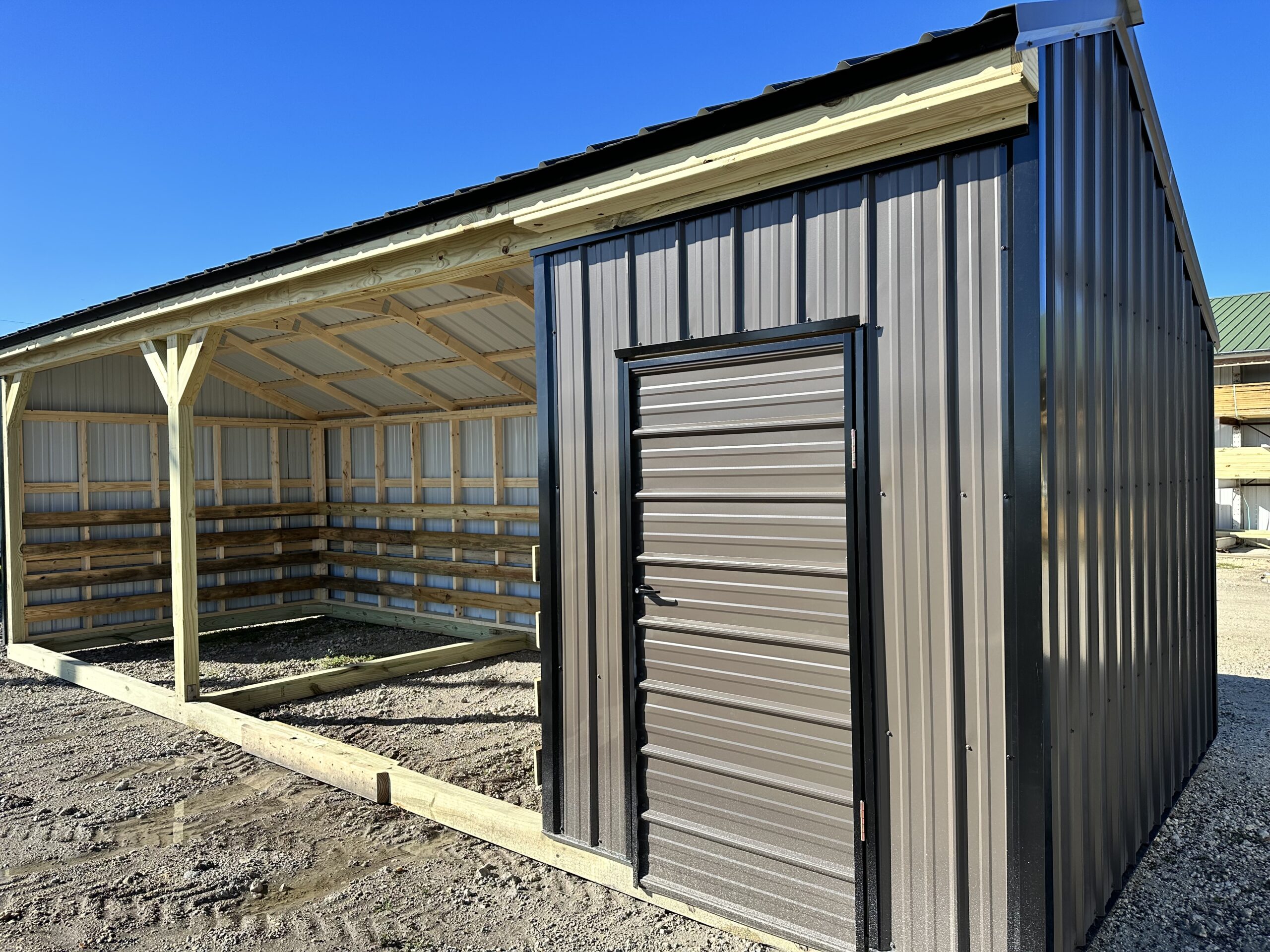 farm and yard metal loafing run in shed with storage room